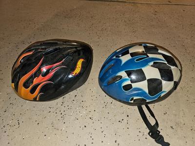 Two Child sized Bike helmets - Hot wheels & PTI