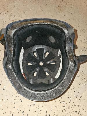 Two skate boarding helmets