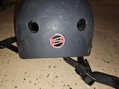 Two skate boarding helmets