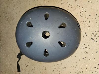 Two skate boarding helmets