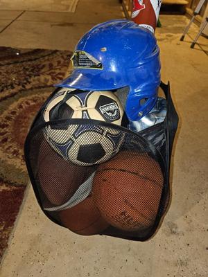 Net bag of sports balls - and a helmet