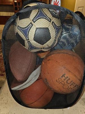 Net bag of sports balls - and a helmet