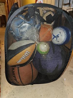 Net bag of sports balls - and a helmet