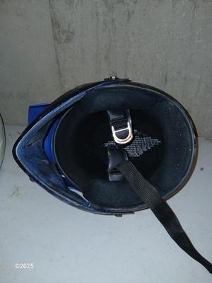 Two older dirt Bike helmets -