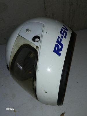 Two older dirt Bike helmets -