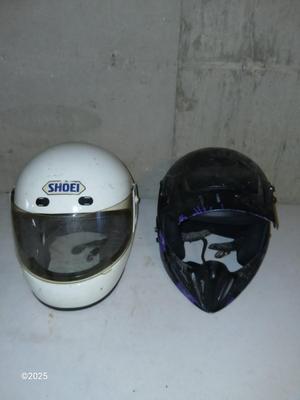 Two older dirt Bike helmets -