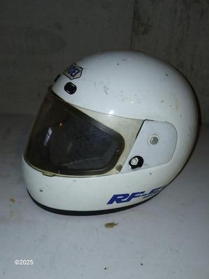 Two older dirt Bike helmets -