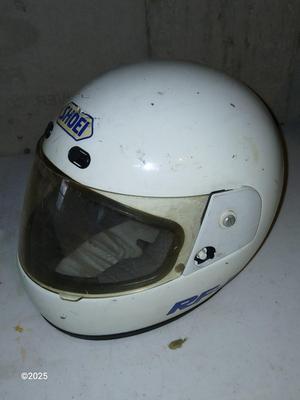 Two older dirt Bike helmets -