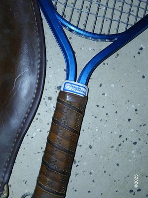 Racquets, paddles with pong balls and a small set of Pool balls