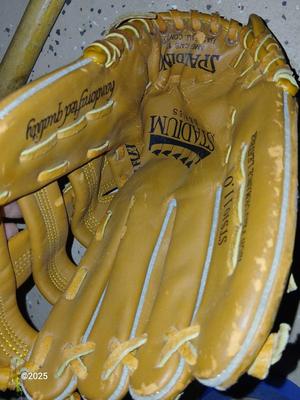 Wooden Rawlings Adirondack t-ball bat - two softball gloves - and a ball