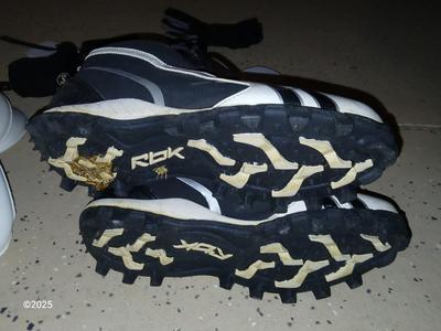 A nice pair of NFL size 9 cleats pads and Nike gloves