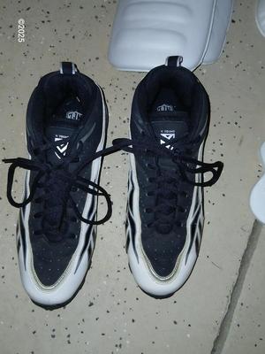 A nice pair of NFL size 9 cleats pads and Nike gloves