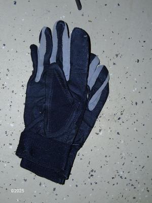 A nice pair of NFL size 9 cleats pads and Nike gloves