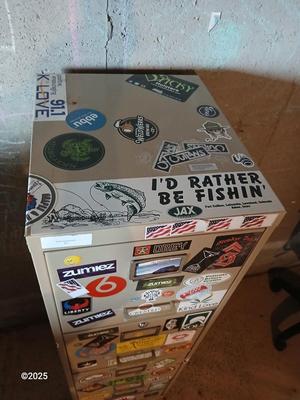 Metal filing cabinet - full of such cool local stickers