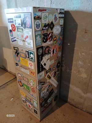 Metal filing cabinet - full of such cool local stickers