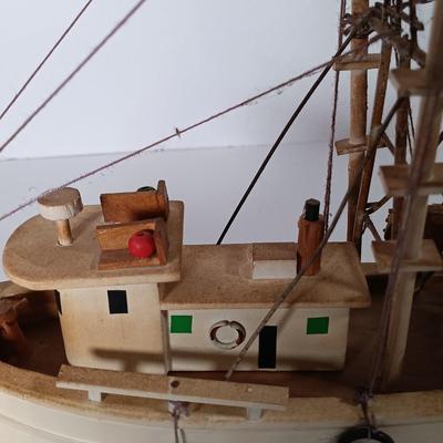 LOT 58D: Miniature Collectible Ships: Hard Resin Chesapeake Ship, Wood Confection Ship, Tybee Island Wood HMS Bounty & More