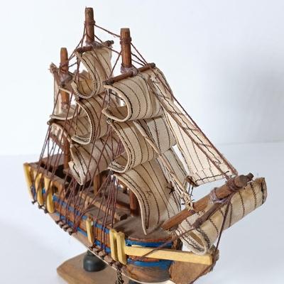 LOT 58D: Miniature Collectible Ships: Hard Resin Chesapeake Ship, Wood Confection Ship, Tybee Island Wood HMS Bounty & More