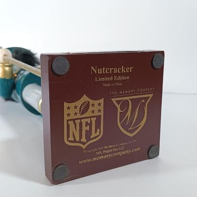 LOT 62D: NFL Christmas Collection Donovan McNabb Santa Sleigh, Memory Co. Philadelphia Eagles Nutcracker & More