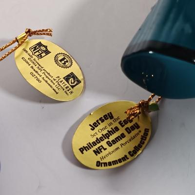 LOT 62D: NFL Christmas Collection Donovan McNabb Santa Sleigh, Memory Co. Philadelphia Eagles Nutcracker & More