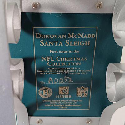 LOT 62D: NFL Christmas Collection Donovan McNabb Santa Sleigh, Memory Co. Philadelphia Eagles Nutcracker & More