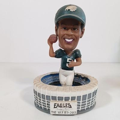 LOT 73B: Forever Collectibles Eagles Numbered Swoop the Mascot, Precious Moments 'Together for an Eagles Win' &...