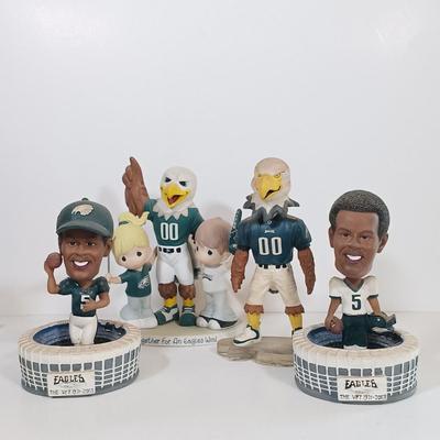 LOT 73B: Forever Collectibles Eagles Numbered Swoop the Mascot, Precious Moments 'Together for an Eagles Win' &...