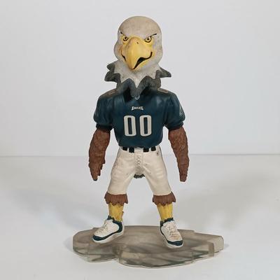 LOT 73B: Forever Collectibles Eagles Numbered Swoop the Mascot, Precious Moments 'Together for an Eagles Win' &...