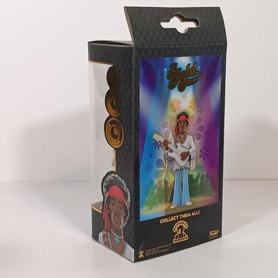 LOT 131B: Autographed Meghan Trainor Photo, Autographed Steel Panther Photo, Harry Chapin Bronze Coins & More