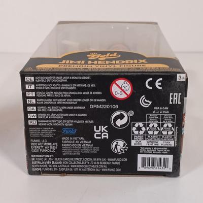 LOT 131B: Autographed Meghan Trainor Photo, Autographed Steel Panther Photo, Harry Chapin Bronze Coins & More