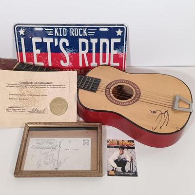 LOT 156B: Autographed Kid Rock Ukulele with COA, Autographed Four Aces Postacard & Kid Rock Novelty License Plate