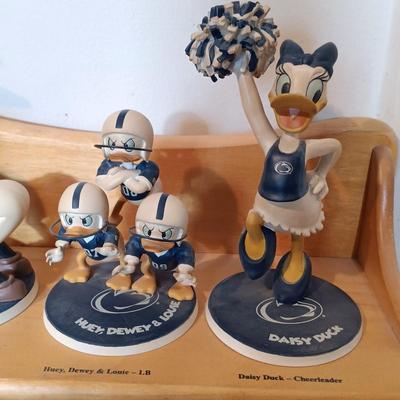 LOT 173B: The Danbury Mint Disney Penn State 9 Figurines with Display Shelf