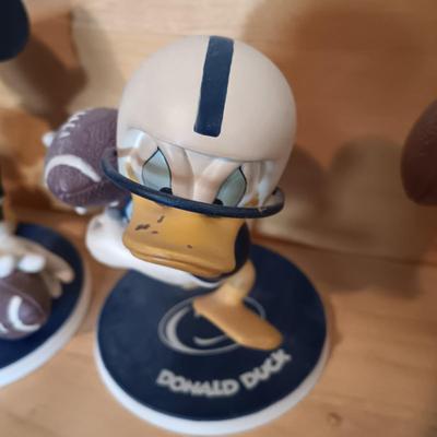 LOT 173B: The Danbury Mint Disney Penn State 9 Figurines with Display Shelf