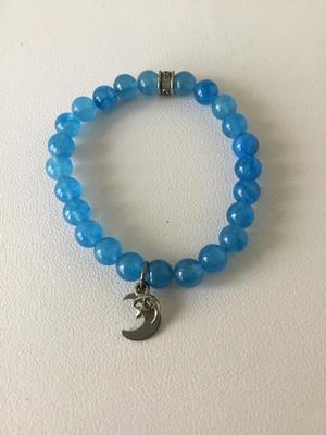 CFC. Marked blue beaded stretchy charm bracelet