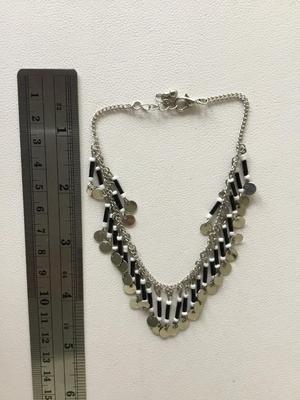 Silver tone tassel bracelet