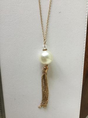 Gold tone faux pearl long necklace