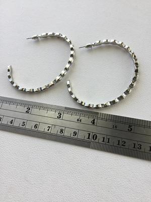 Beautiful silver tone hoop earrings