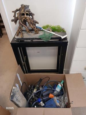 Ten gallon fish tank stand, led lit hood, and aquarium decorations, chemicals, and other fish items