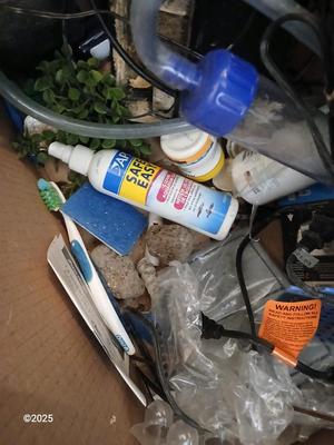 Ten gallon fish tank stand, led lit hood, and aquarium decorations, chemicals, and other fish items