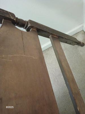 Old sewing cabinet and a old wooden twin sized headboard and footboard