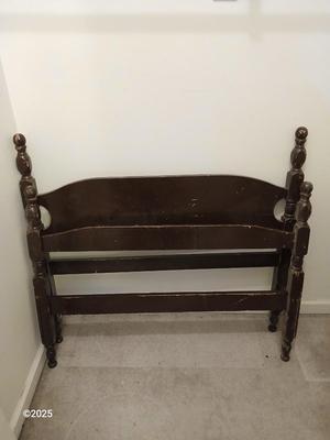 Old sewing cabinet and a old wooden twin sized headboard and footboard