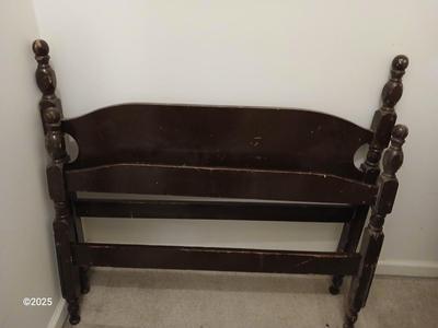 Old sewing cabinet and a old wooden twin sized headboard and footboard