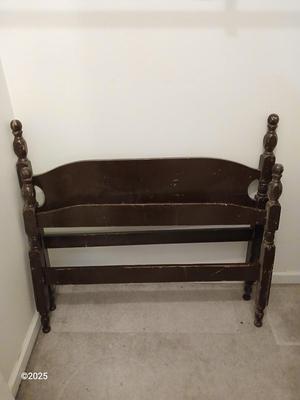 Old sewing cabinet and a old wooden twin sized headboard and footboard