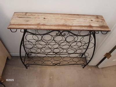 Wrought iron Wine rack with rustic wooden top shelf