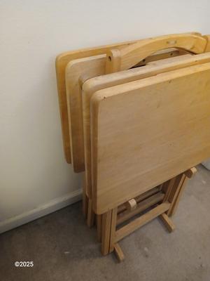Four wooden T.V. Trays with storage rack