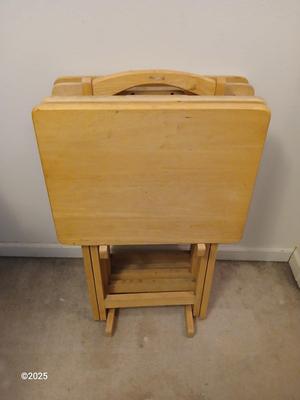 Four wooden T.V. Trays with storage rack