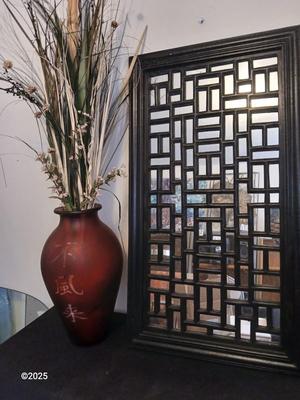 Red frosted glass vase with Japanese writing - dried floral arrangement and a Hand crafted wood wall panel mirror