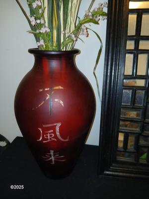 Red frosted glass vase with Japanese writing - dried floral arrangement and a Hand crafted wood wall panel mirror