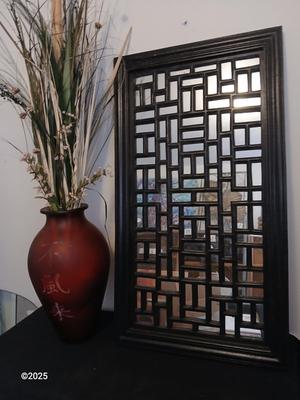 Red frosted glass vase with Japanese writing - dried floral arrangement and a Hand crafted wood wall panel mirror