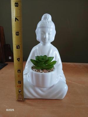 Ceramic buddha figure with Inhale Exhale canvas