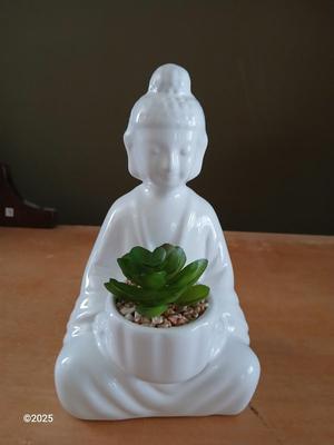 Ceramic buddha figure with Inhale Exhale canvas
